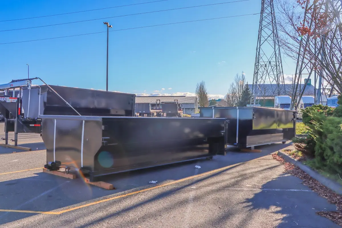 Roll-off dumpster ready for waste disposal at job site for Roofing Dumpster Rental in Patterson